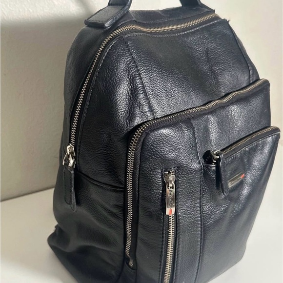 bodhi-handbags-mens-canvas-leather-trim-backpack Tom Beckbe Canvas Backpack Bark Our waxed canvas Backpack has a large front pocket with a weatherproof flap BODHI EXPLORER DUFFLE BAG -